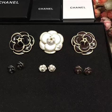 chanel clear camellia brooch|chanel camellia hoop earrings.